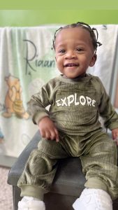 little boy smiling at camera
