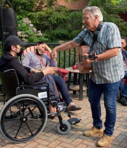 Singalong Pete and guest on fire pit night