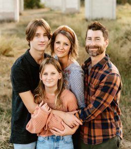 family photo with mom, dad, son and daughter