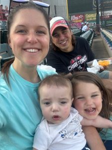 family of four hanging out together