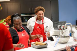 woman and man cooking