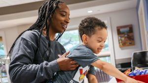 little boy and mom at RMHC NEO