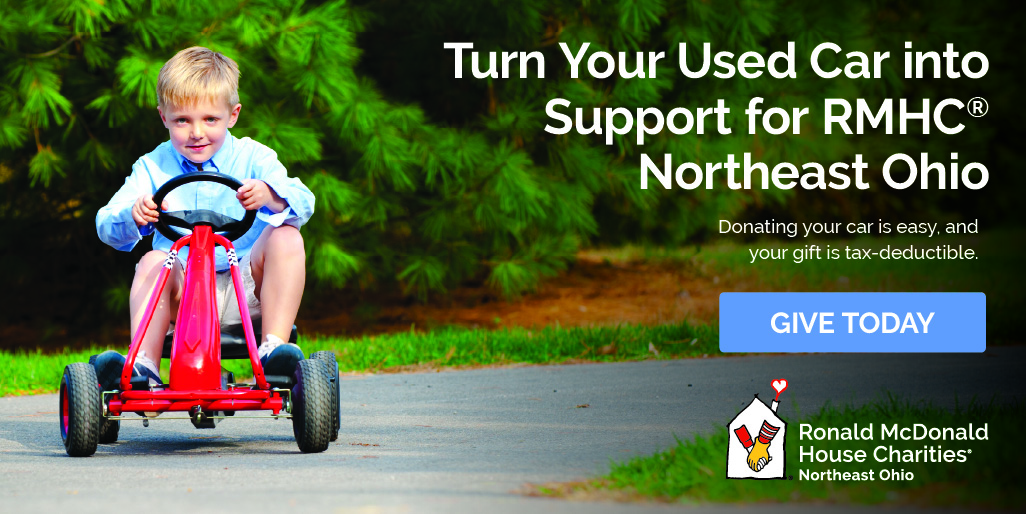 child on tricycle, turn used car into support for RMHC NEO