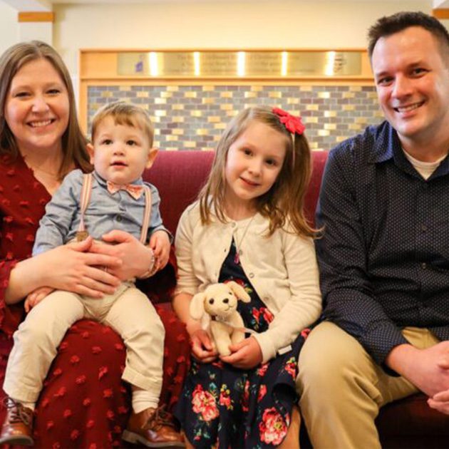 Mom, Dad and kids at the house