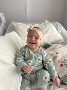 little girl in hospital bed