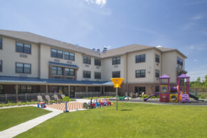 Outdoor common area with patio and playground