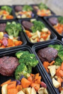 steak and vegetable meals close-up